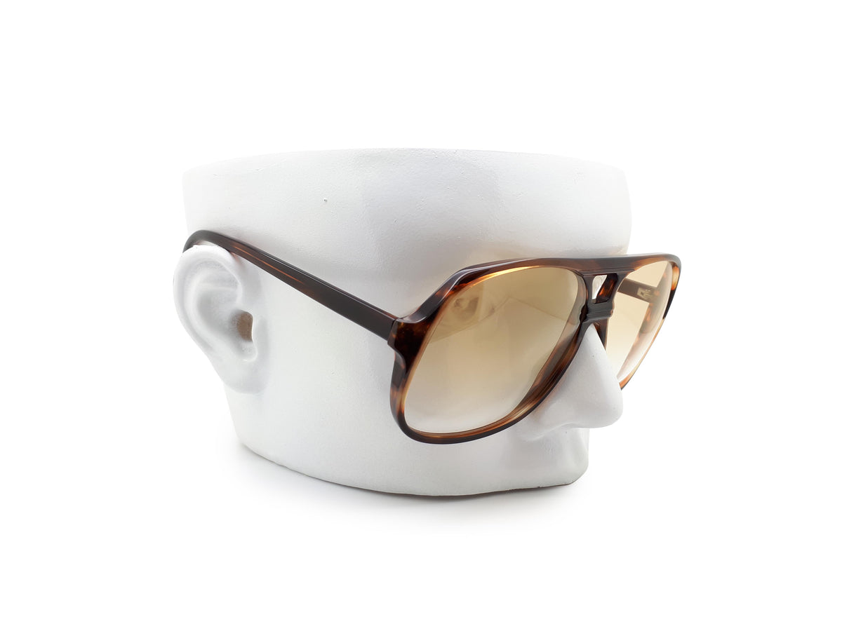 Luixottica Macho amber sunglasses