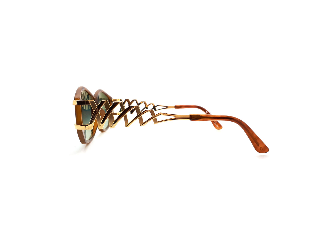 Paloma Picasso sunglasses with green lenses