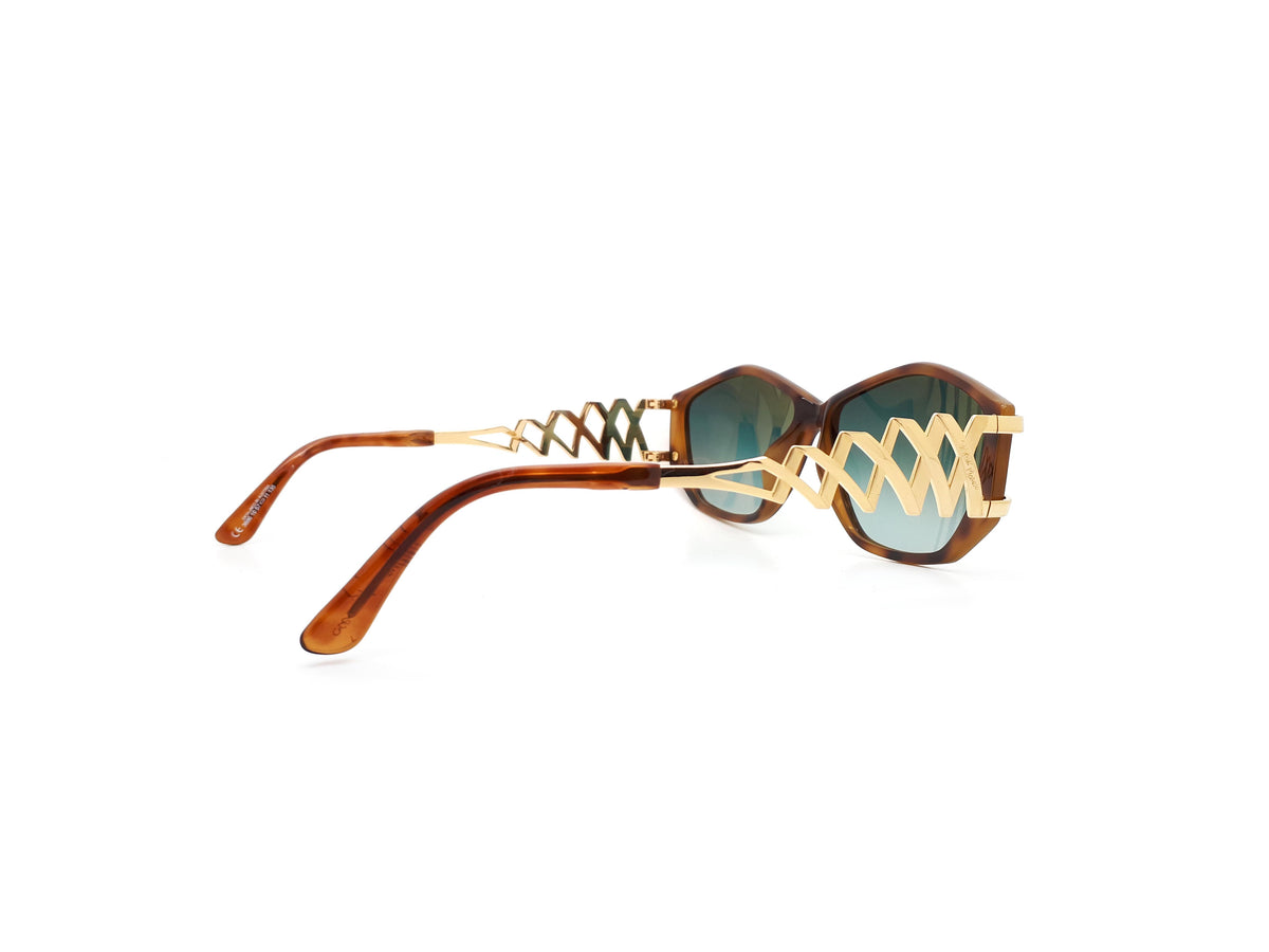 Paloma Picasso sunglasses with green lenses