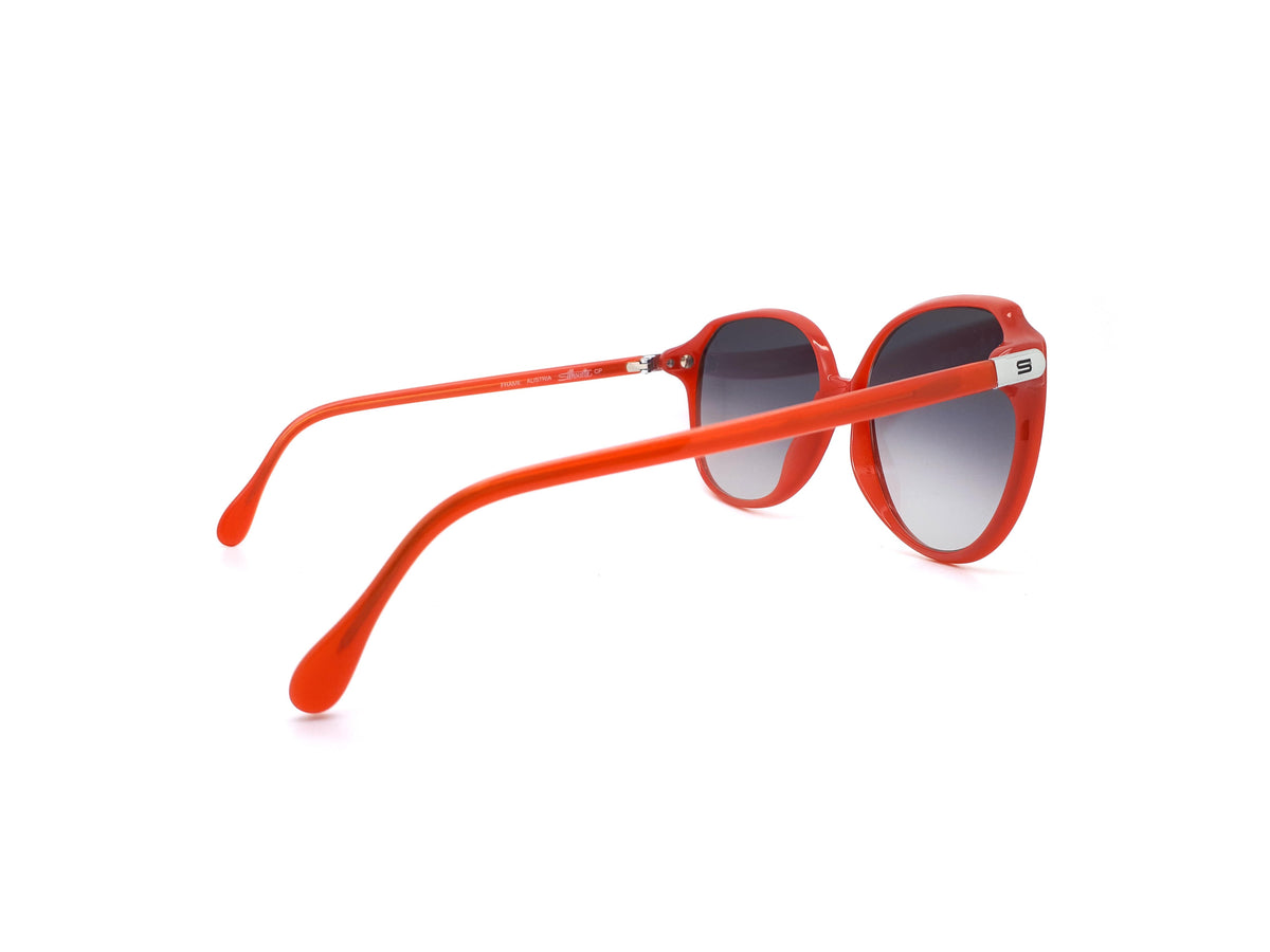 Red Silhouette Sunglasses with blue gradient lenses